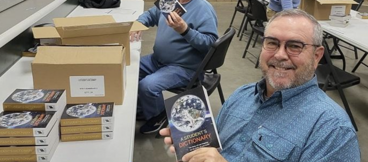 reveille-rotary-claremore-dictionary-donation